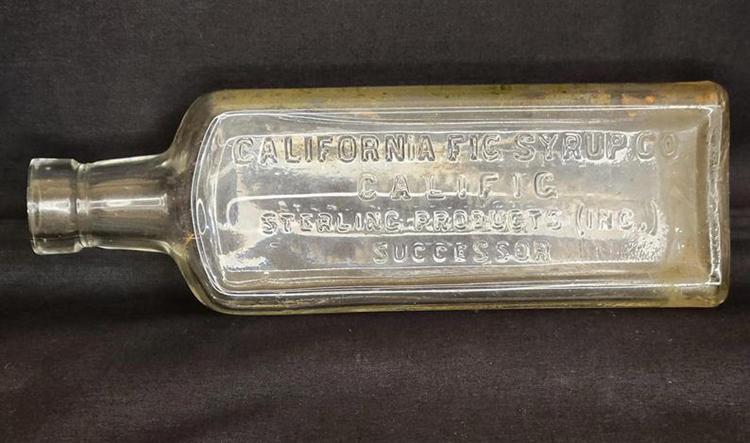 California Fig Syrup Antique glass bottle. Molded lettering in glass. Vintage glass Pharmacy