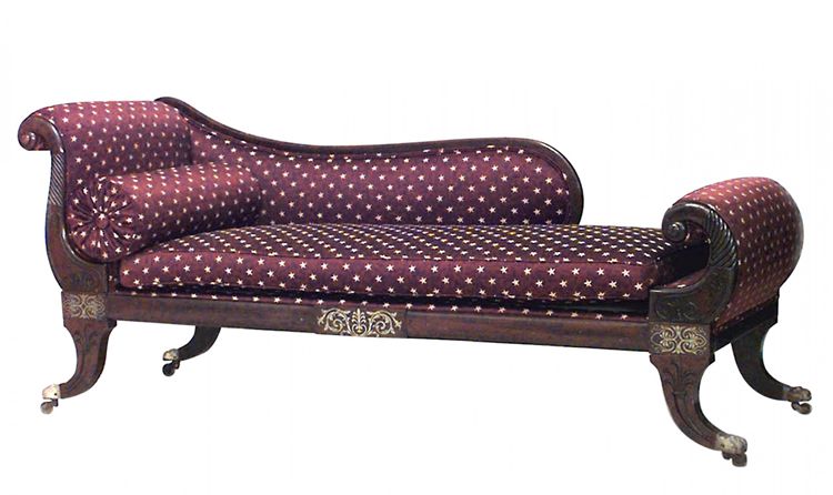 English Regency-style (19th Century) mahogany and brass inlaid roll arm récamier with maroon and gold star design upholstery.