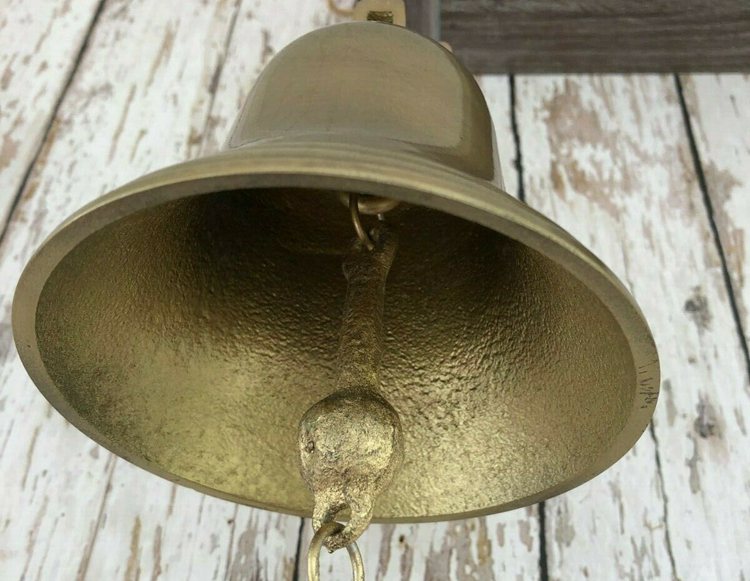 closely inspect the edges of the bell