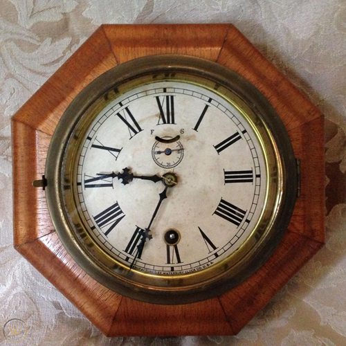 ANTIQUE WATERBURY LEVER OCTAGON GALLERY WALL CLOCK.