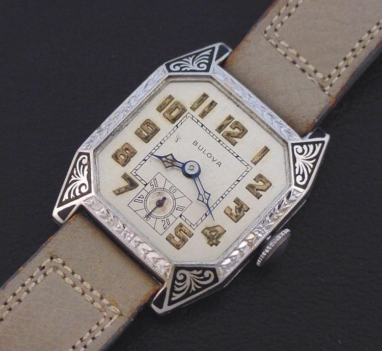 Bulova “Lone Eagle” men’s Art Deco design wristwatch in 14K white gold fill with black enamel bezel, circa 1928.