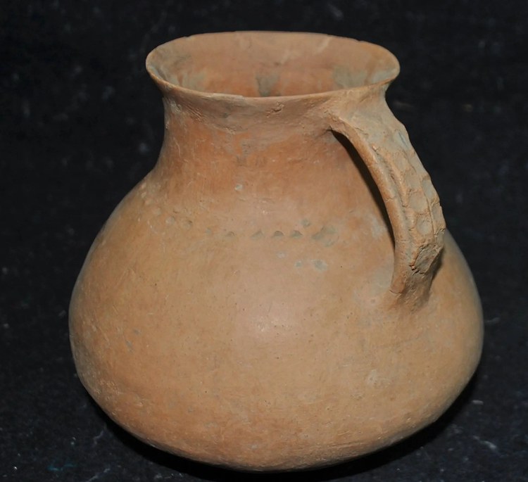 Red pottery jar with one ear