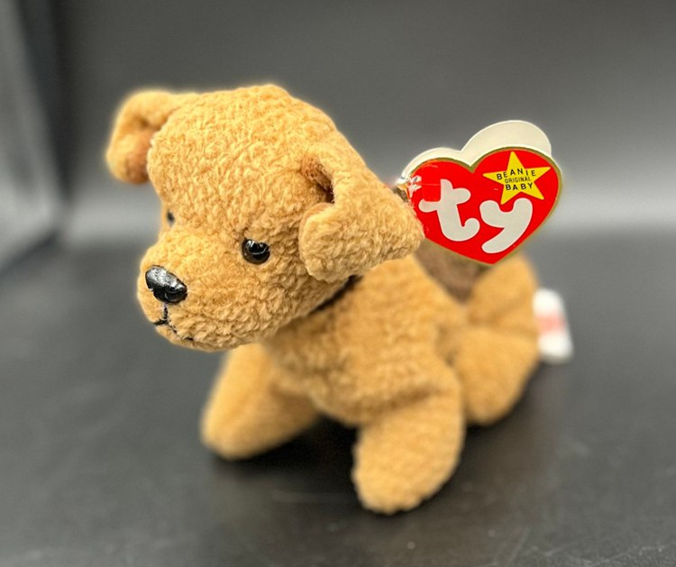 The retired 1996 Ty Beanie Baby Tuffy The Dog