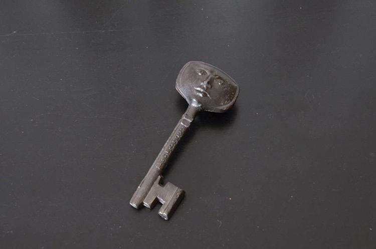 Vintage Skeleton Key with Faces