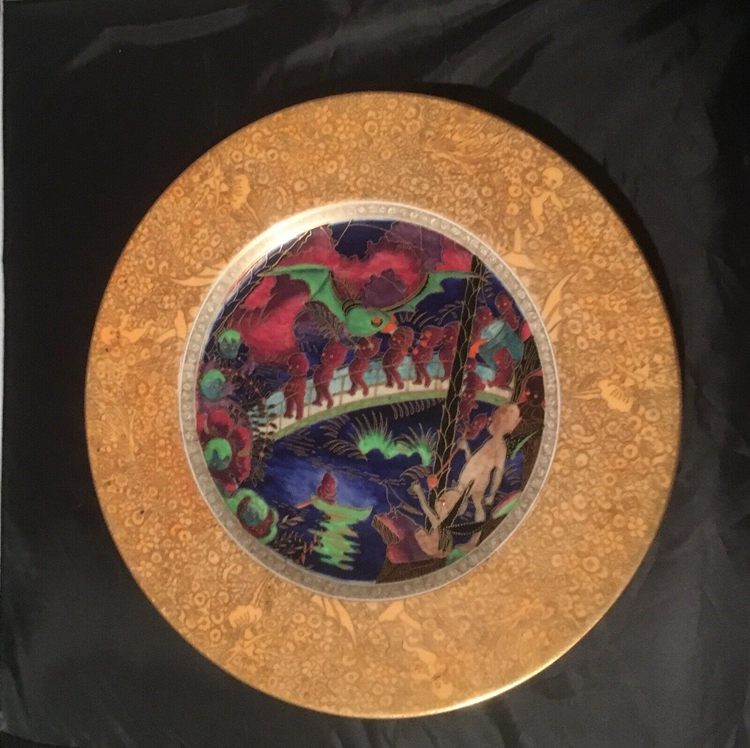 A gold plate with a colorful center