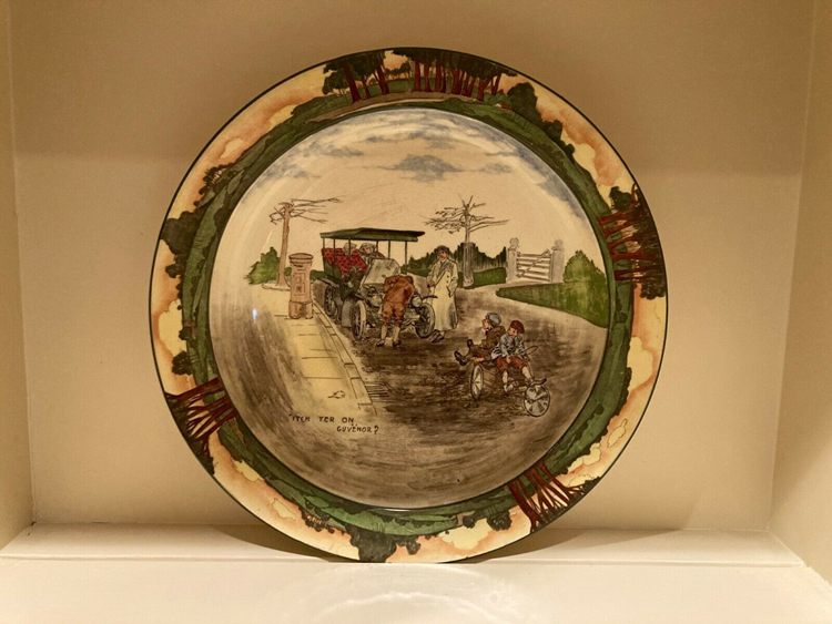 A plate with a picture of a dirt road