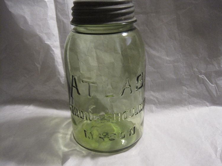 An Olive Green Atlas Strong Shoulder Mason Jar