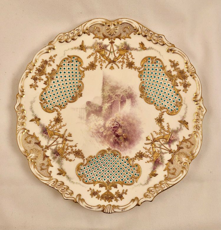 Beautiful porcelain plate with a gold rim