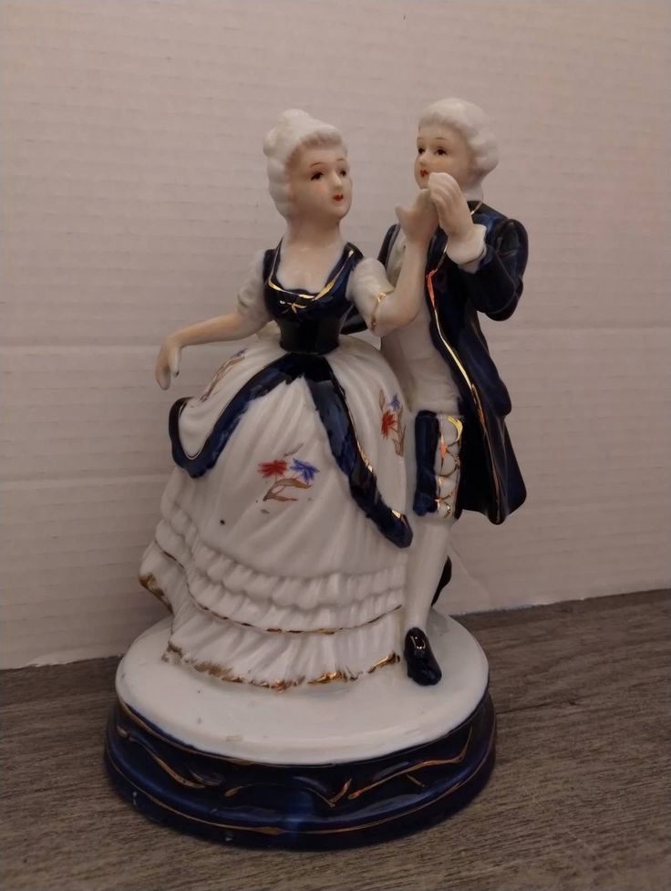 Music Boxes With Porcelain Figurines